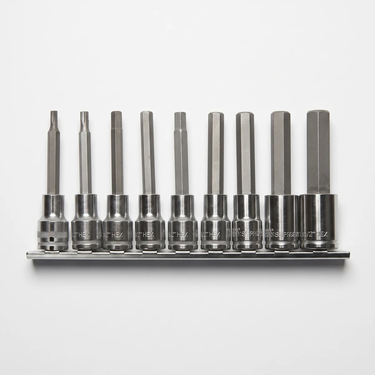 A silver metal 1/2-Inch Drive In-Hex Socket Set featuring nine hex bits organized on a sturdy metal rail.
