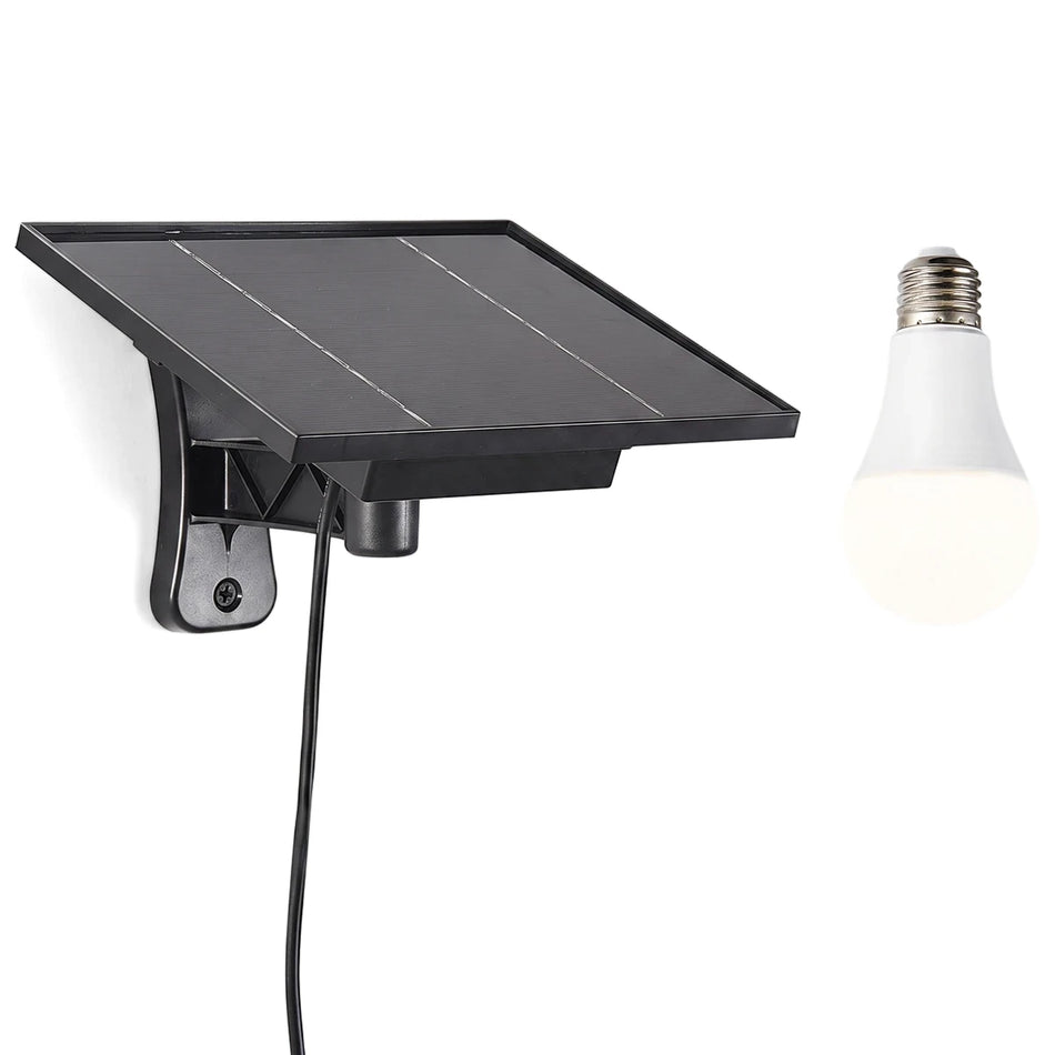 Black 12V solar panel with multiple photovoltaic cells and a white LED light bulb with a standard E26/E27 screw base.