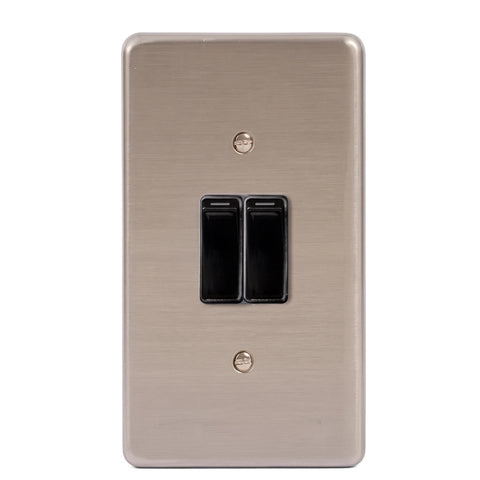 Two lever light switch with a brushed metal wall plate and two black rocker switches.