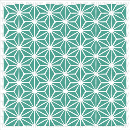 White geometric star-like pattern paint stencil with repeating hexagonal and triangular shapes on a teal background.