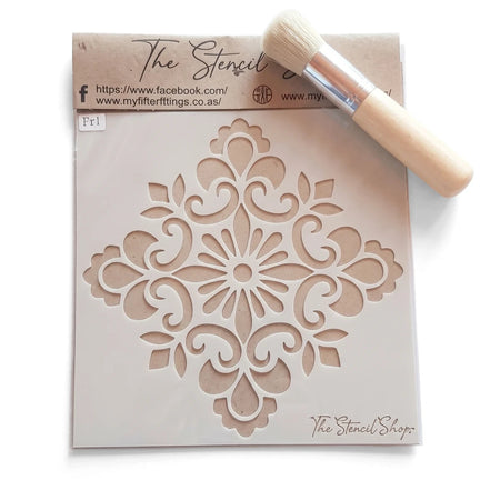2022-150-4 Paint Stencils kit featuring a white stencil with a decorative pattern and a natural bristled painting brush.