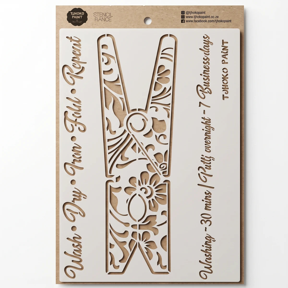 2022-A4-3 paint stencil featuring a large clothesline pin design with intricate floral patterns on a light brown cardboard