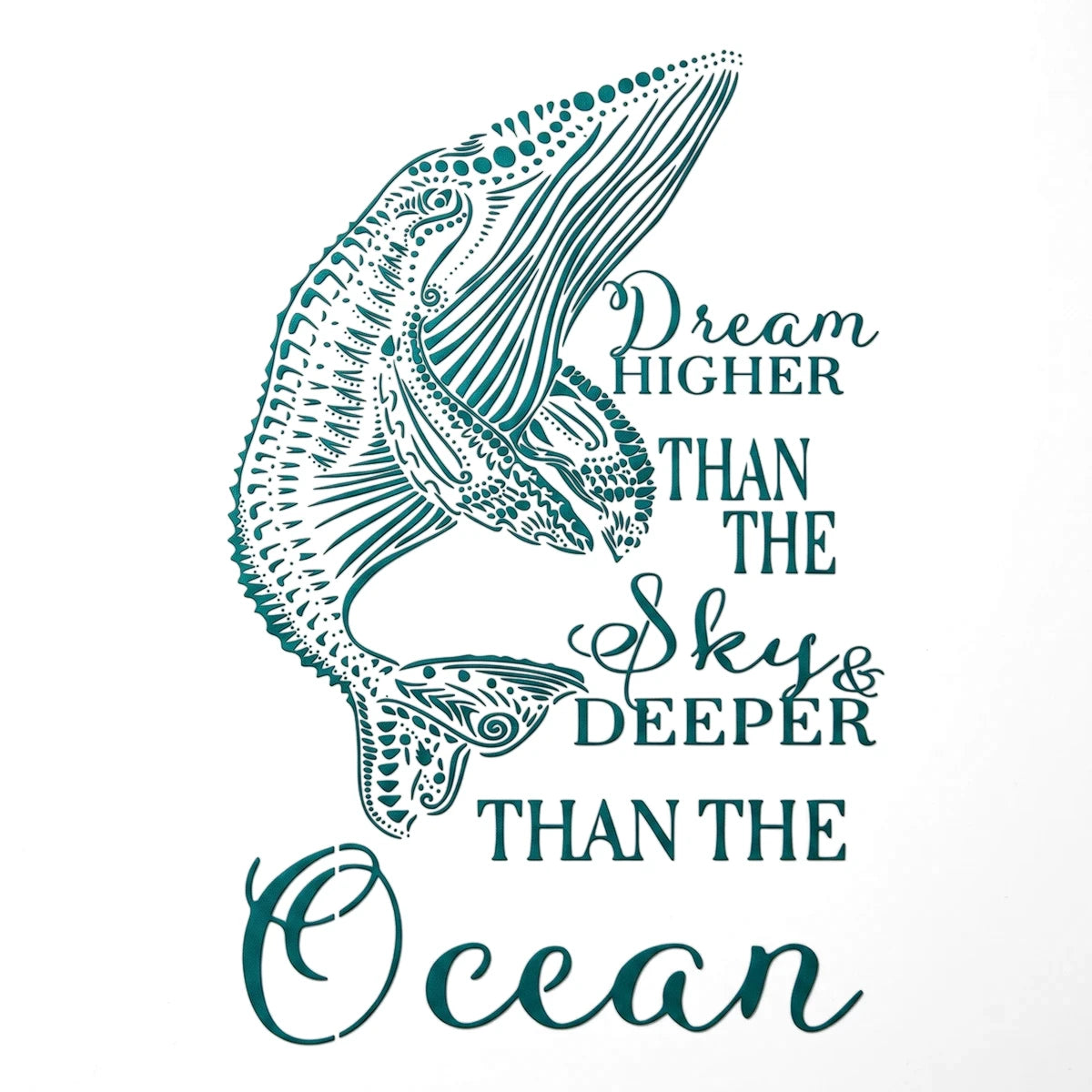 Teal ornate whale illustration with the inspirational quote 'Dream Higher Than The Sky & Deeper Than The Ocean' for the