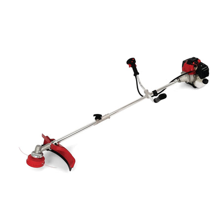 Red and silver 32Cc Petrol Brush Cutter, a powerful outdoor gardening tool for clearing dense vegetation.