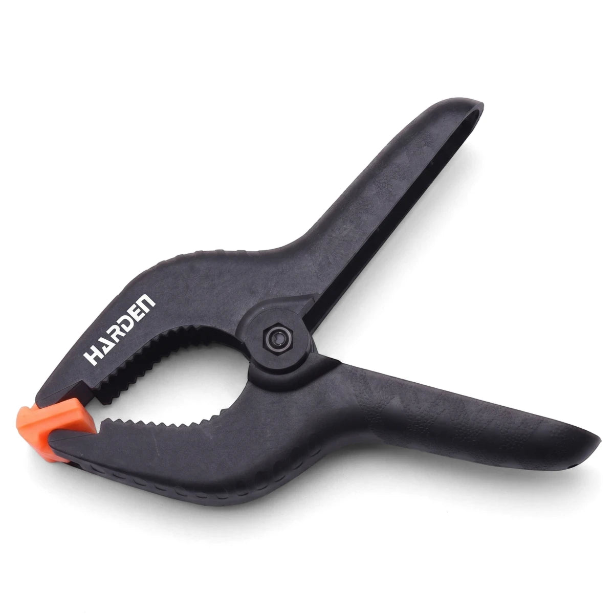 A single 4-inch black plastic spring clamp with orange jaw tips and serrated gripping surfaces, displayed open.