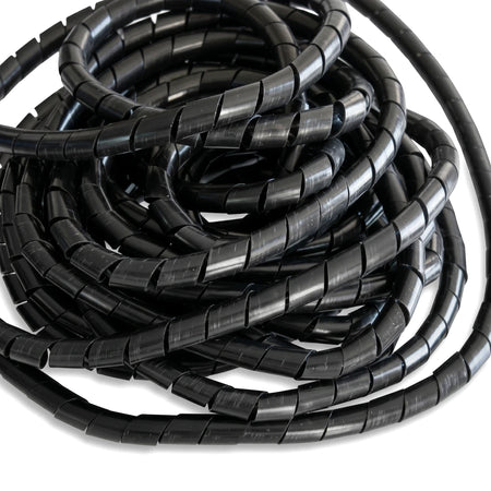 Black 7.5mm spiral wrapping cable organizer coiled in a stack, showcasing its flexible design.