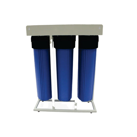three blue filter housings on a white metal stand with a pale top panel by big blue