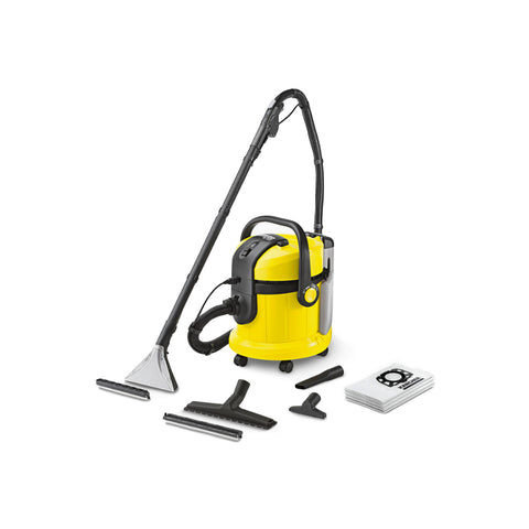 Karcher floor cleaning machine with yellow body and black handle, long hose, wide nozzle, and assorted attachments.