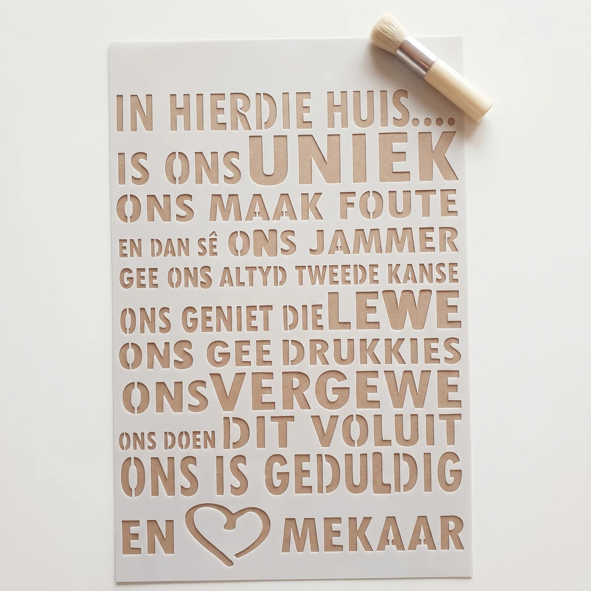 A3-28 Stencil 88 paint stencil with Afrikaans text and a heart shape, used for craft projects.