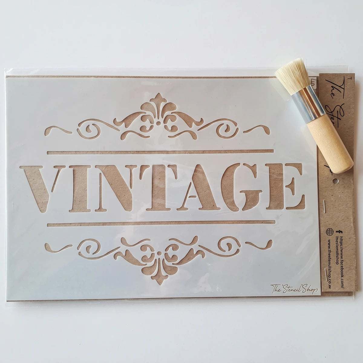 A4-7 Stencil 56 Paint Stencils with 'VINTAGE' design and ornate borders, accompanied by a round brush.