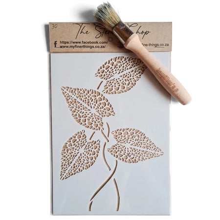 White A5-30 leaf pattern stencil from The Stencil Shop, accompanied by a Hamilton's wooden handle paint brush for crafting