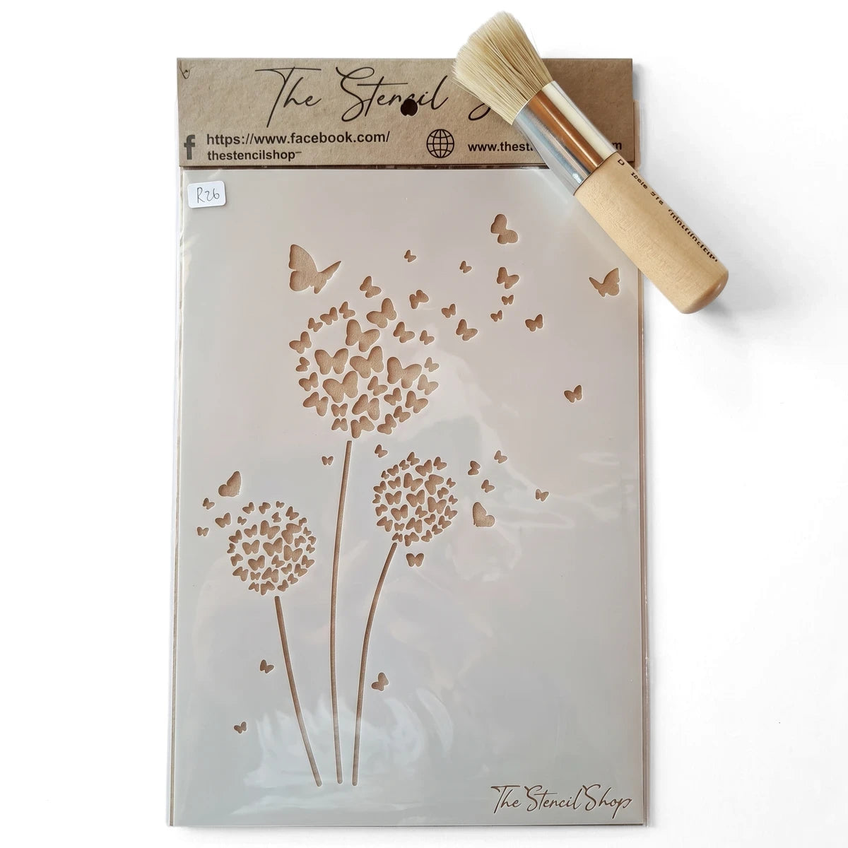 A5-6 Stencil 31 butterfly dandelion design with a wooden handle stencil brush on a textured surface.