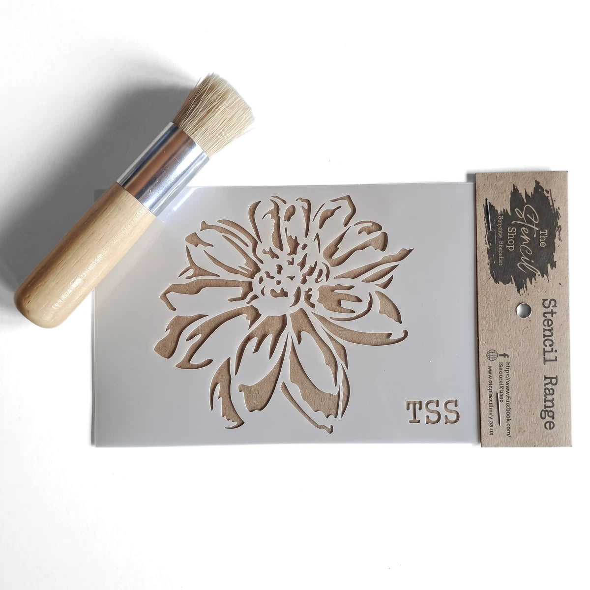 A6-27 Stencil 22 paint stencil featuring a large flower design, accompanied by a wooden handled stenciling brush.