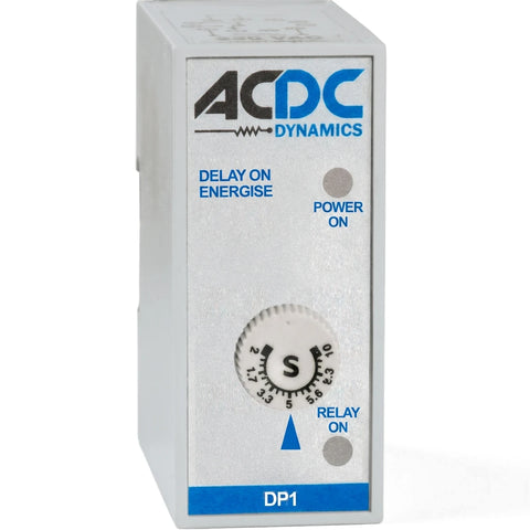 ACDC Dynamics DP1 Multi Function Multi Voltage Timer with a light gray rectangular body and white rotary knob.