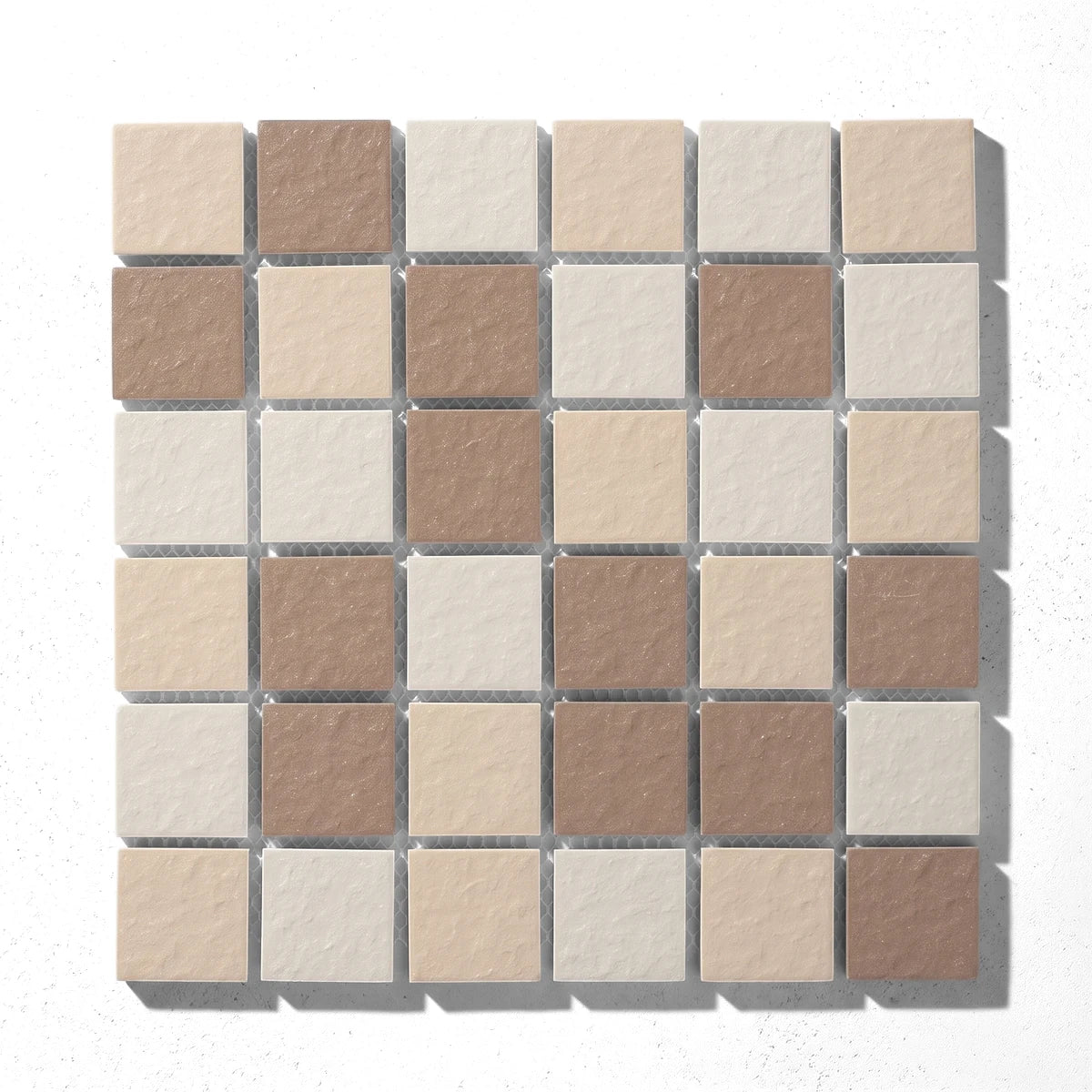 Addo Matte Square Mosaic Tile sheet, featuring a textured arrangement of alternating beige, light cream, and brown 45mm