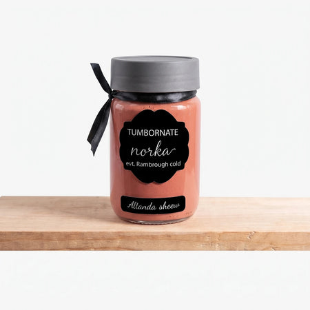 Adorable Amina 250ml chalk paint in a reddish-orange glass jar with a black label and grey lid, adorned with a ribbon,