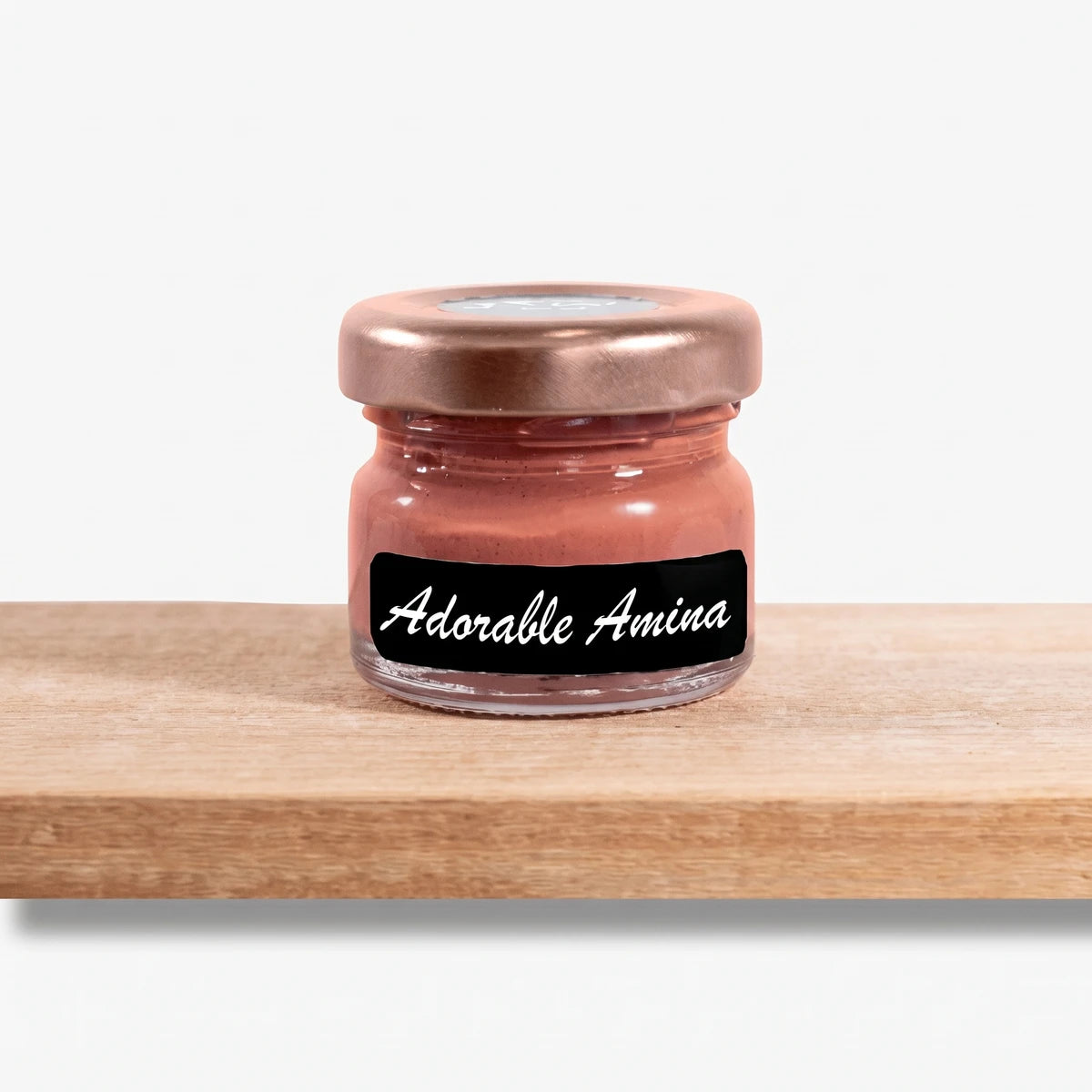 Adorable Amina Colour3 25ml paint in a small glass jar with a copper lid, displaying its reddish-brown hue.
