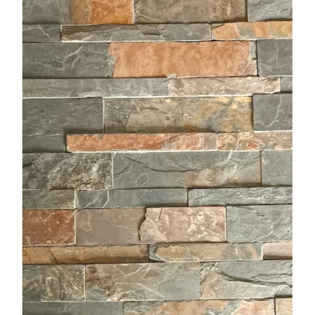 Autumn Blend Slate Wall Cladding, close-up of stacked natural stone in rustic grey, brown, and orange tones.