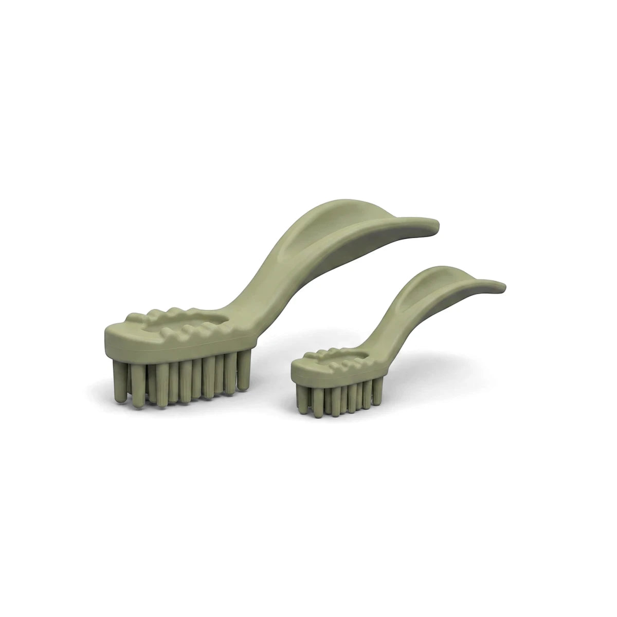 Two pale green brush-shaped dog dental chews from Bags O' Wags Denties Tooth Xs for pet oral hygiene.