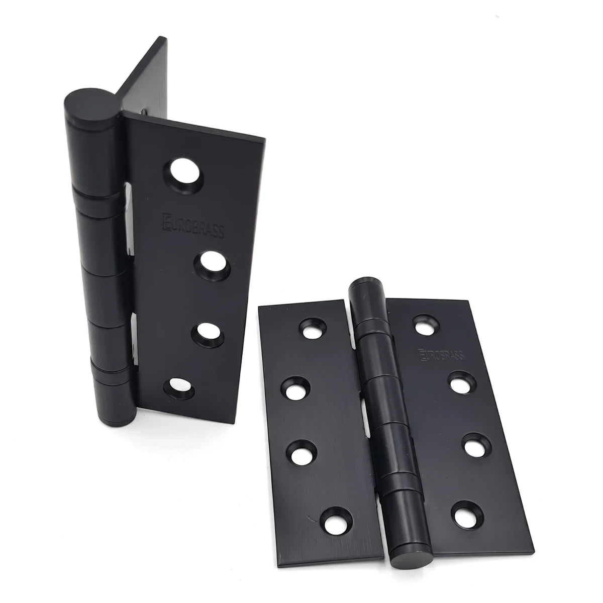 A pair of black 100mm steel butt hinges, showing the EUROBRASS brand, with visible screw holes on a white background.