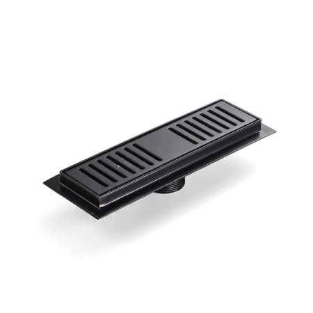 Black 100mm rectangular shower trap with a linear grate design, viewed at a slight angle on a reflective surface.
