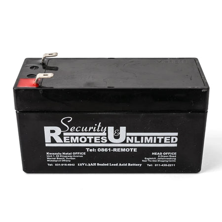 Black 12V 1.3Ah sealed lead acid battery with white branding and metal terminals, rectangular shape.