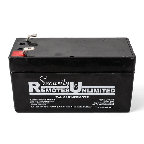 Black 12V 1.3Ah sealed lead acid battery with white branding and metal terminals, rectangular shape.