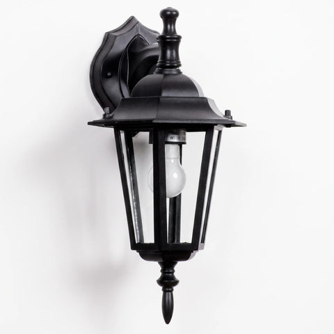 Black 6-panel downward-facing die-cast aluminum exterior wall light with a decorative mount and exposed bulb.