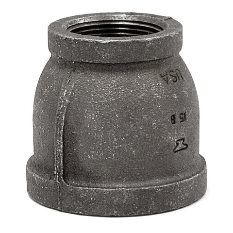 Black galvanized reducing socket pipe fitting, 1 1/2 inch by 1 inch, for plumbing and industrial applications.