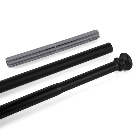 A black large shower curtain rod with a decorative finial and a grey ribbed extender piece, angled on a white surface.