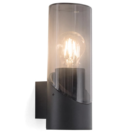 Black modern wall-mounted light fixture with an aluminum extrusion profile and a smoked plastic cover, showcasing a glowing