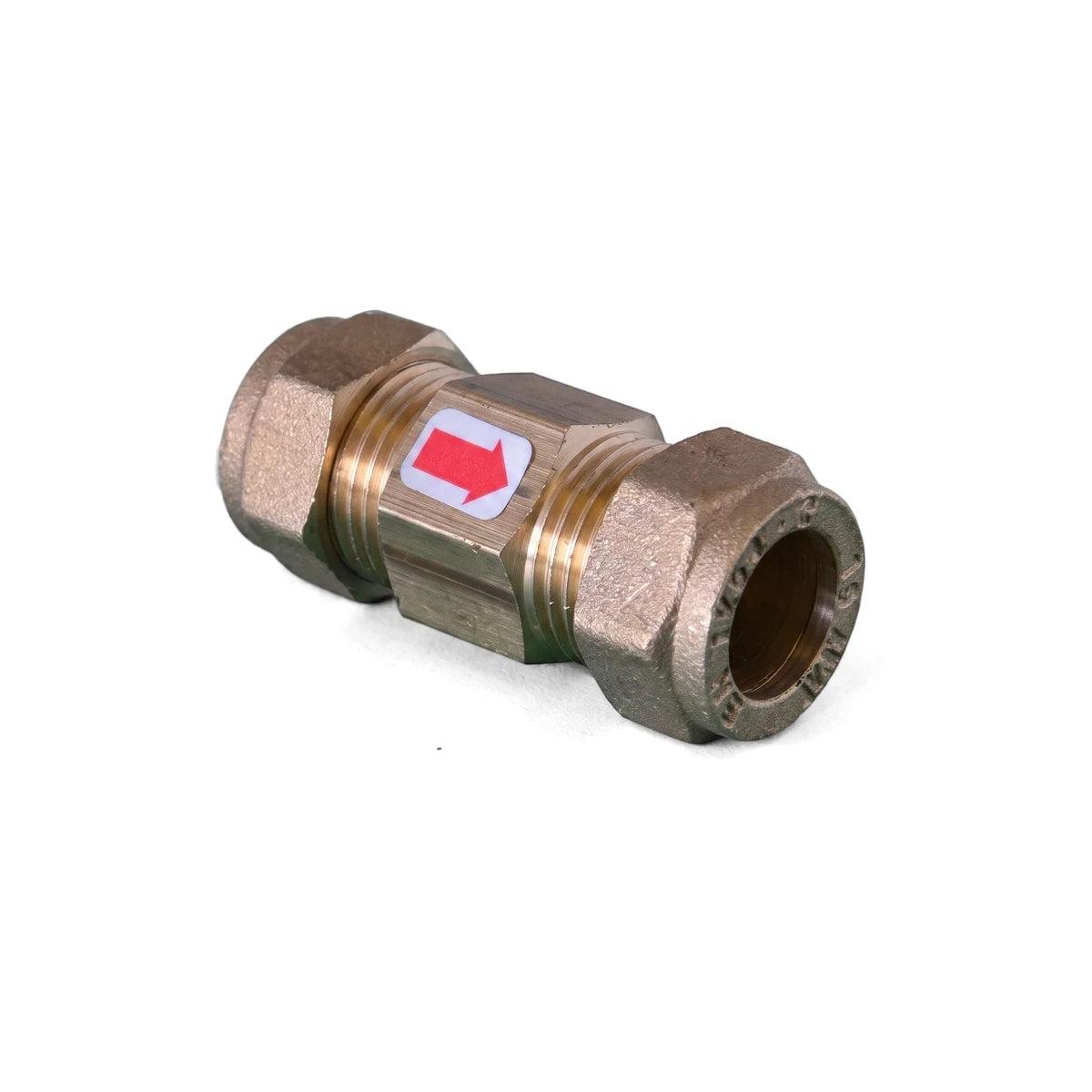 A brass 15mm non-return valve with compression fittings, featuring a white label with a red directional arrow on its body.