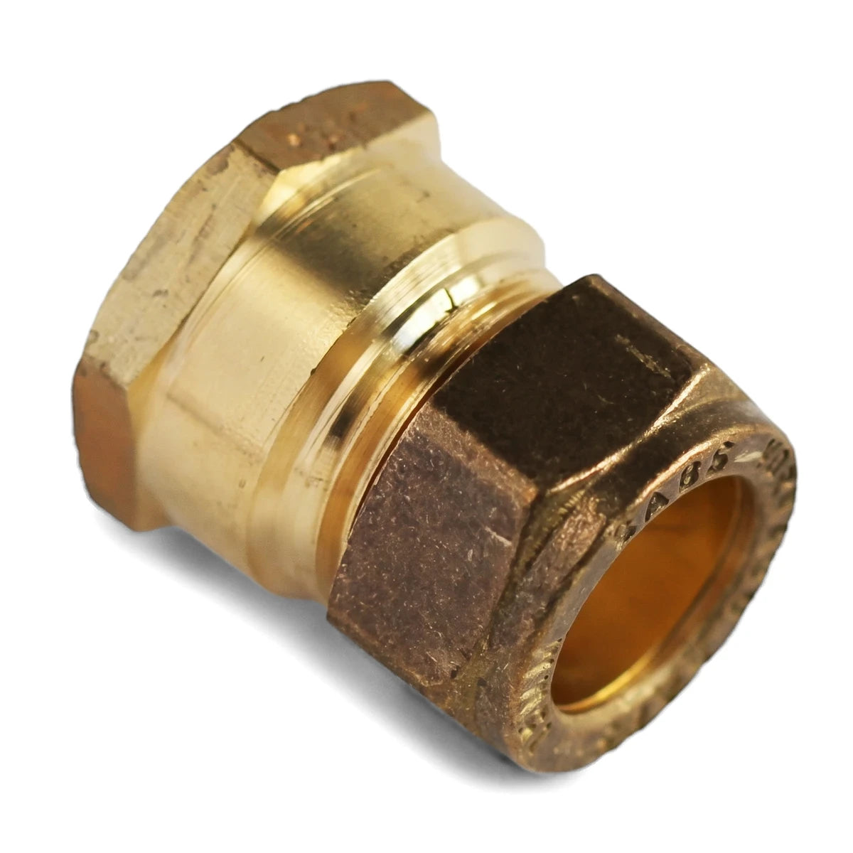 An angled view of a brass Compression CXFI Coupler, highlighting its hexagonal nuts and textured metal surface.