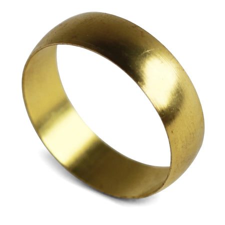 A single brass compression ring, gold and metallic, shot from an angled view on a white background.