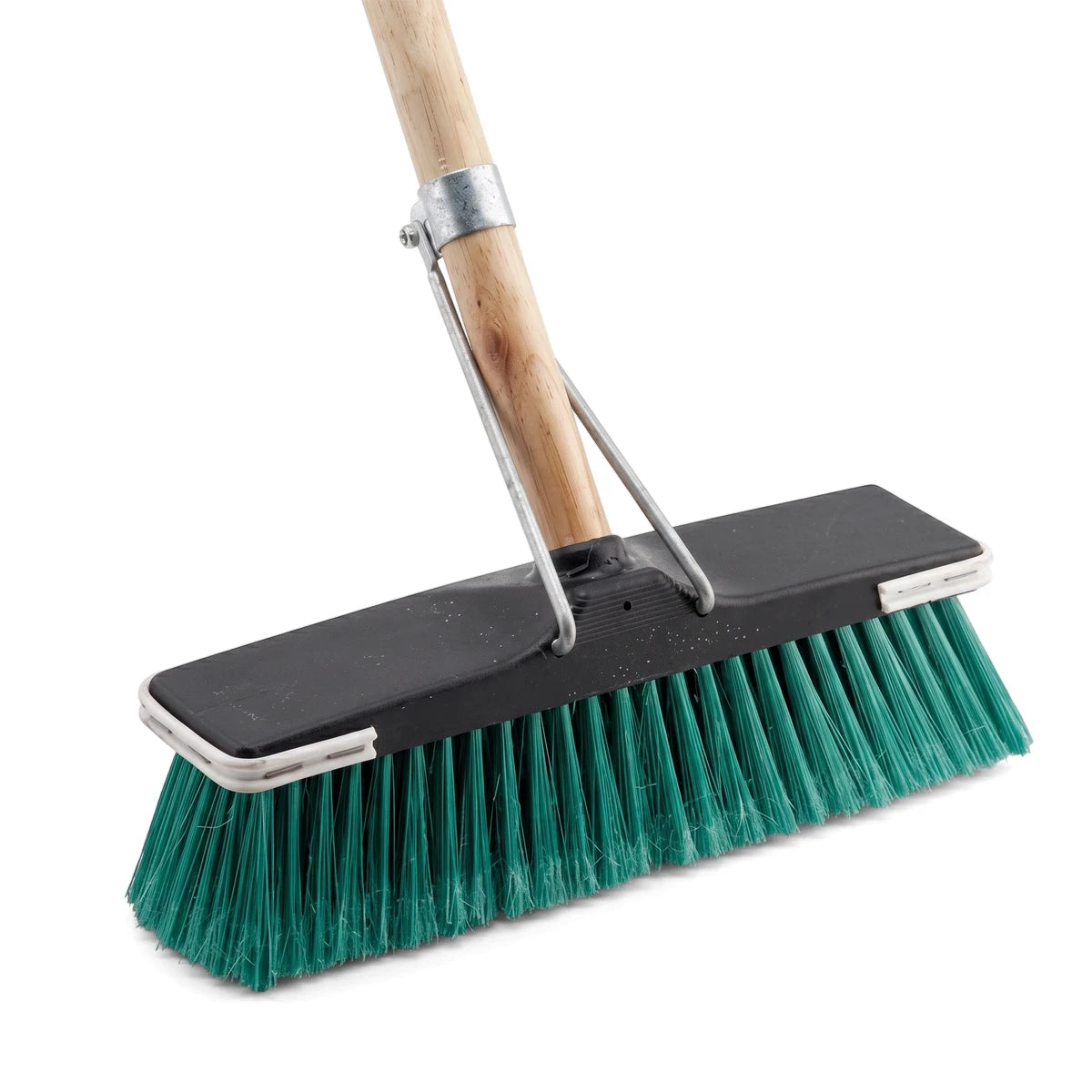 Angled view of a floor broom with a brown wooden handle, black head, and vibrant green bristles, designed for effective