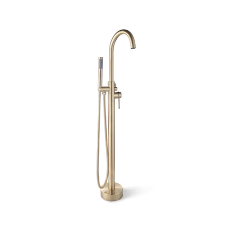 Modern brush brass free standing bath mixer with a curved main spout and a matching handheld shower on a flexible hose.