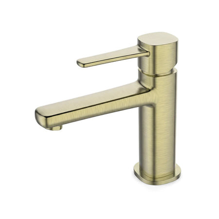 A modern brushed brass single lever basin mixer faucet, viewed from the side, showcasing its elegant design and metallic