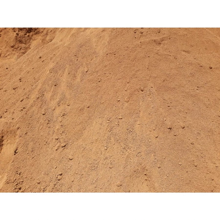 Building Sand 40kg shown as a loose pile of light brown sand with fine grains and small pebbles, close-up view.