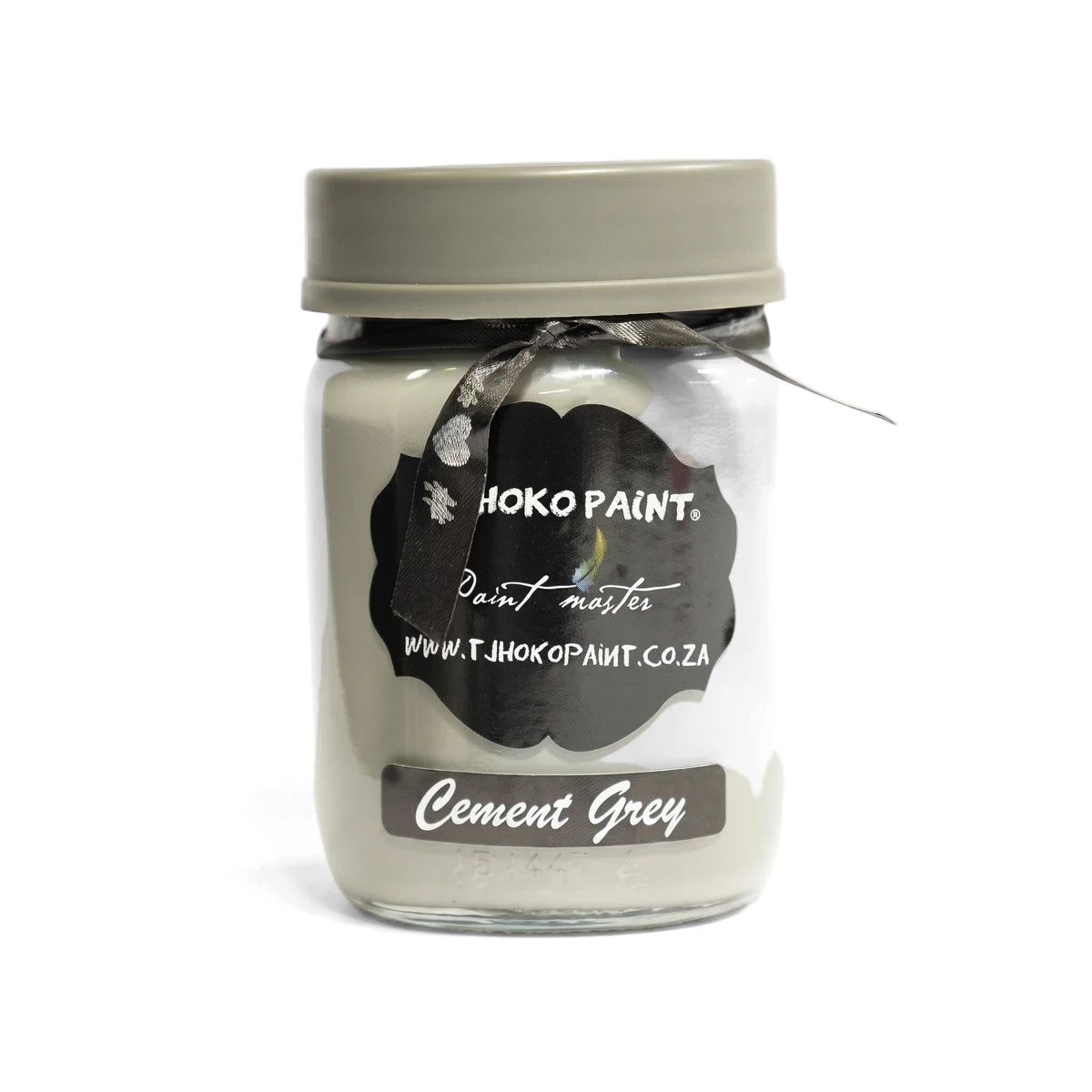 Cement Grey 250ml Hoko Paint chalk paint in a clear glass jar with a grey lid and black label with a decorative ribbon.