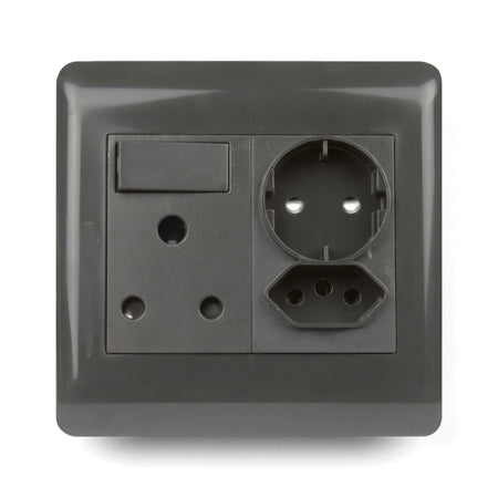 Close-up of a charcoal grey single switched socket featuring a 16A Type F, a 3-pin round, and a 3-pin flat IEC socket.
