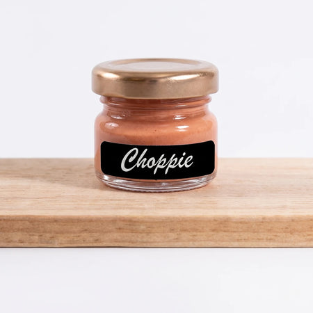 Small glass jar of Choppie (Colour3) 25ml paint with a black label and gold lid, displayed on a wooden surface.