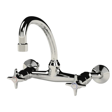 Cobra Star Heavy Pattern chrome wall-mount sink mixer with a curved spout and cross-handle controls.