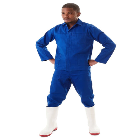 Conti Suit blue coverall with long sleeves and chest pocket, designed for industrial use and paired with white boots.