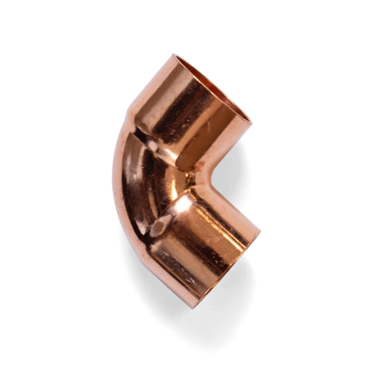 A shiny copper 90 Degrees CXC 22mm elbow pipe fitting, essential for plumbing applications, depicted at an angle.