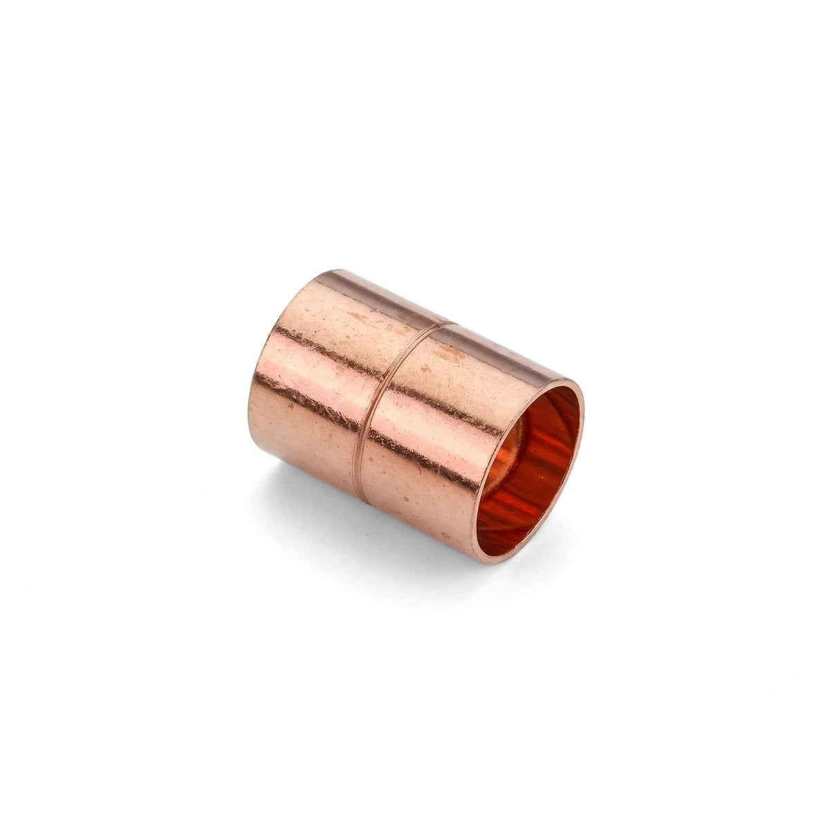 Copper CXC coupler plumbing fitting, featuring a cylindrical shape and a central seam, isolated on a white background.