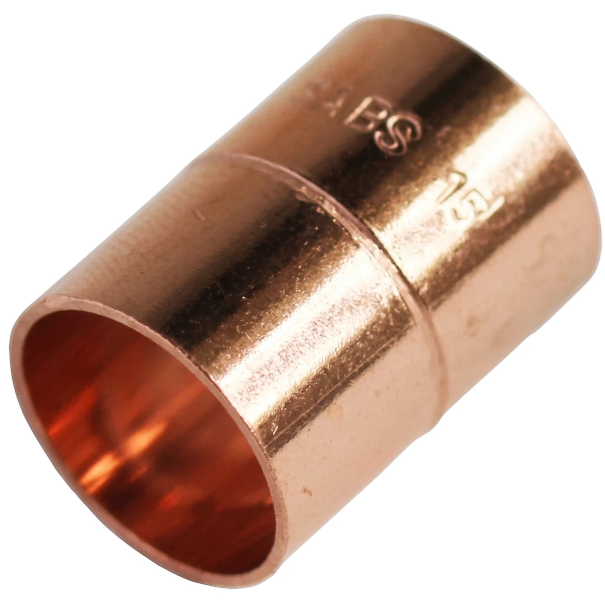 Close-up, angled view of a copper CXC coupler with 'SABS' and '15' markings, used for plumbing applications.