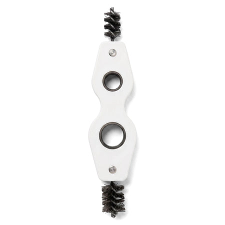 Double-ended copper tube cleaning brush with a white ergonomic handle and black bristles.