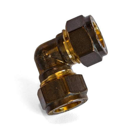 Bronze 90-degree CXC compression elbow pipe fitting for plumbing or industrial applications, shown angled on a white