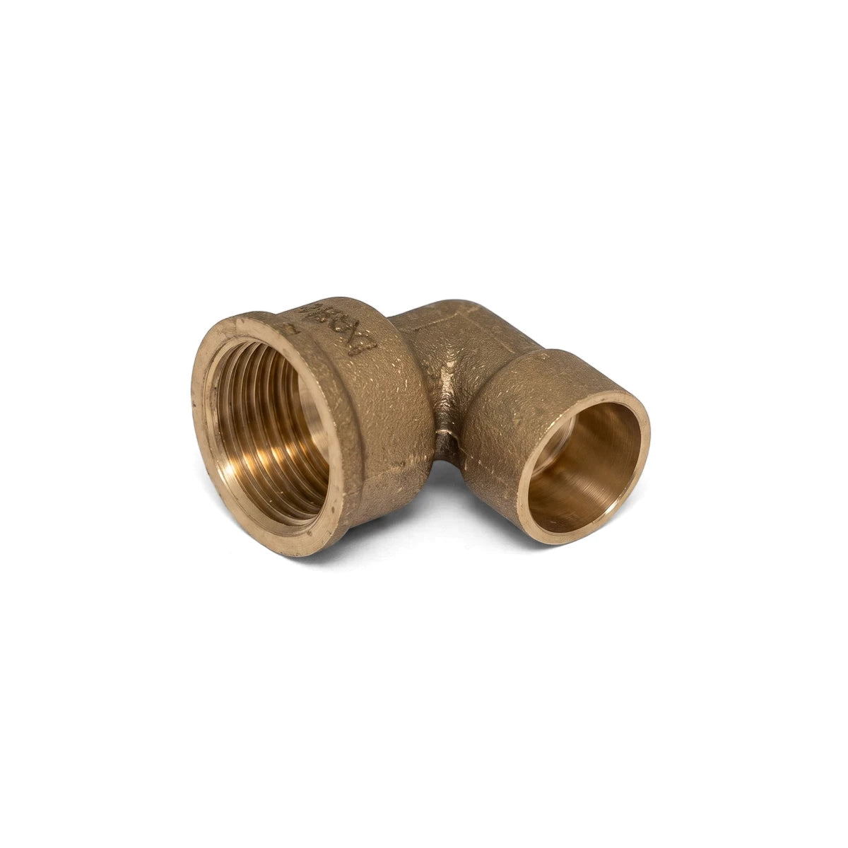 A brass 90-degree CXFI elbow plumbing fitting shown from a slightly elevated side view, featuring a threaded female end and