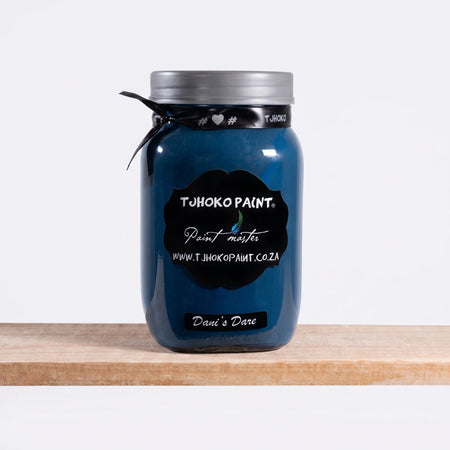 Dani's Dare 500ml Chalk Paint in a deep blue hue, presented in a clear glass jar with a silver lid.